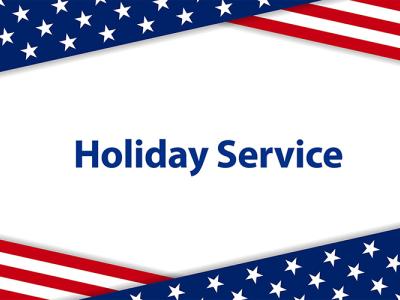 Banner with "holiday service" printed