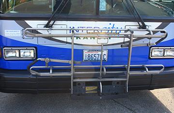Front of bus featuring a bike rack by Sport Works