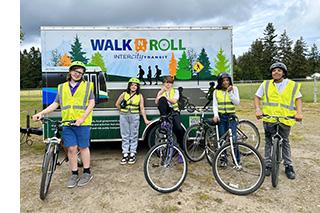 Four teens ready for a bike ride